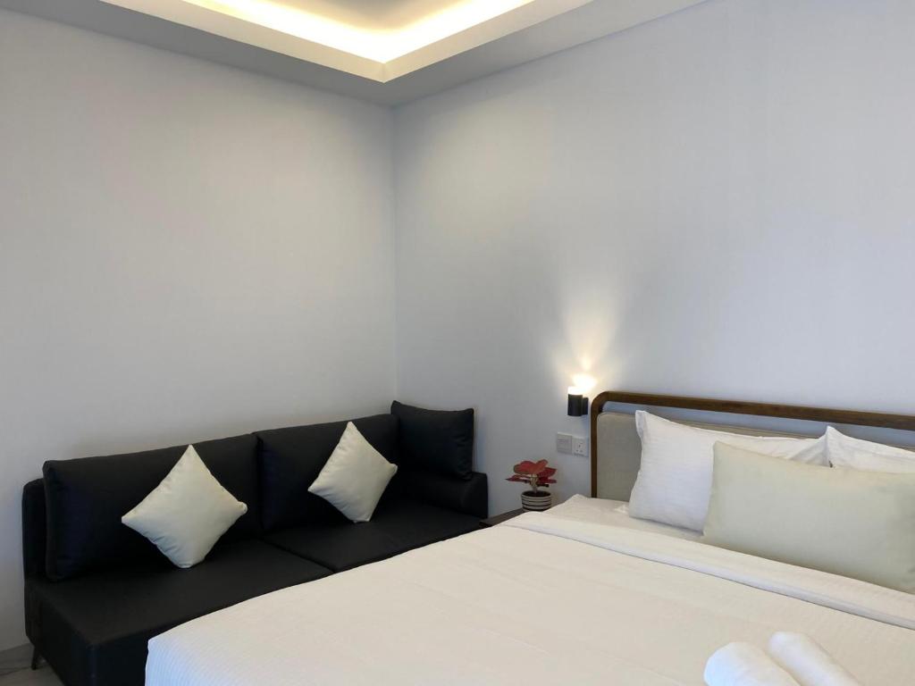 Postel nebo postele na pokoji v ubytování CS Junction Point - Double Deluxe Room - DDR