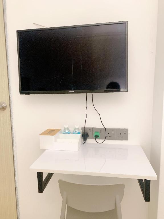 TV a/nebo společenská místnost v ubytování One Stop Hotel Ipoh