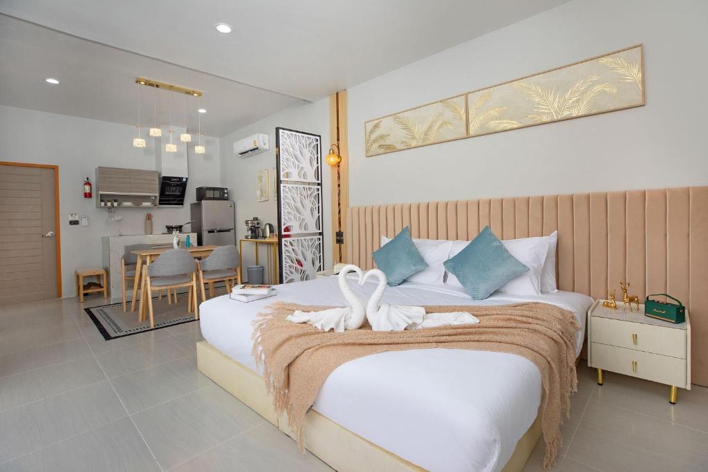 Postel nebo postele na pokoji v ubytování Best Time Pool Suites