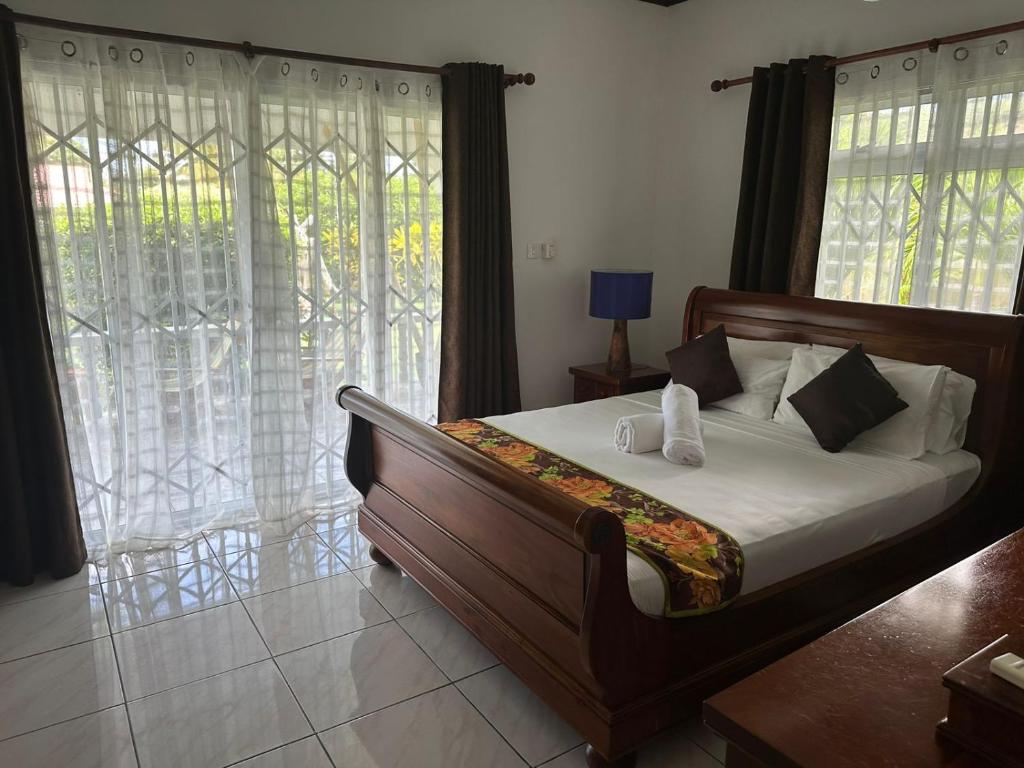 Postel nebo postele na pokoji v ubytování Leo Selfcatering
