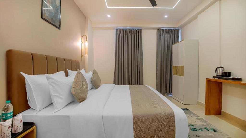 Postel nebo postele na pokoji v ubytování PerfectStayz Premium Cadillac