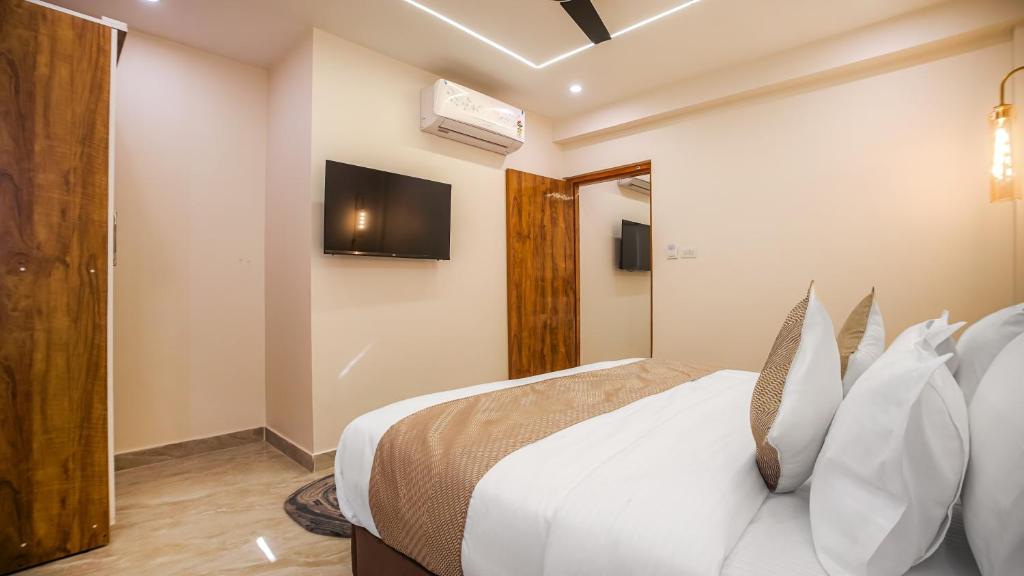 Postel nebo postele na pokoji v ubytování PerfectStayz Premium Cadillac