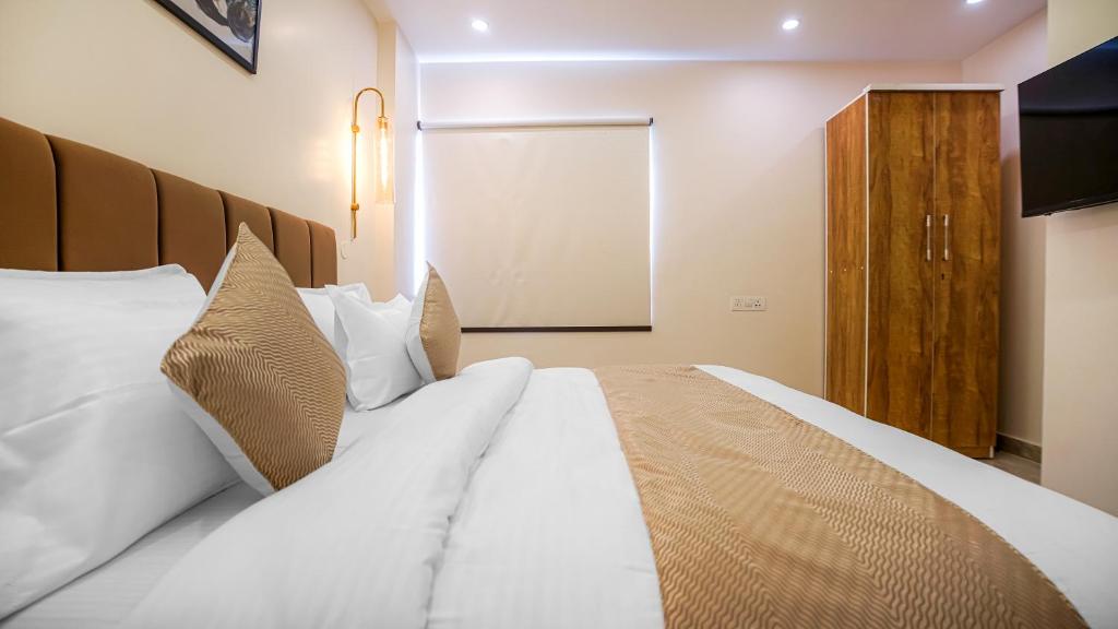 Postel nebo postele na pokoji v ubytování PerfectStayz Premium Cadillac