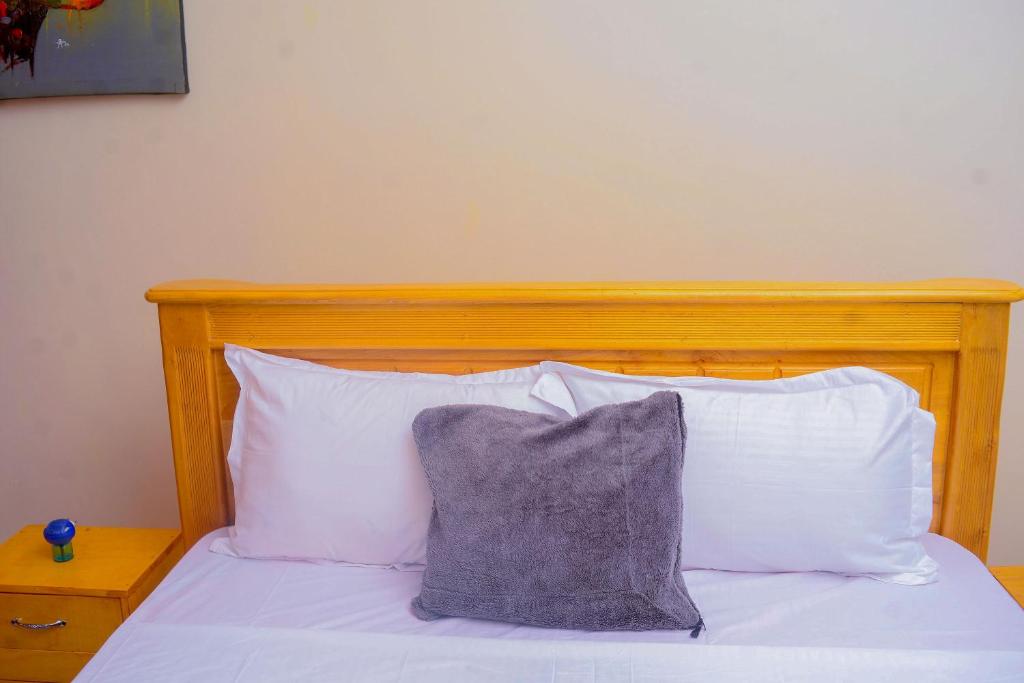 Postel nebo postele na pokoji v ubytování Chabrees Residence