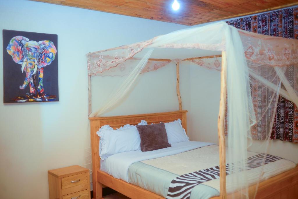 Postel nebo postele na pokoji v ubytování Chabrees Residence