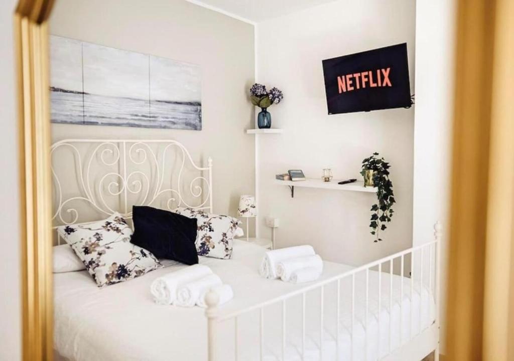 TORRE DALU' - a due passi dalla Spiaggia di Porta Vecchia, con Terrazzo privato e Netflix - Housity