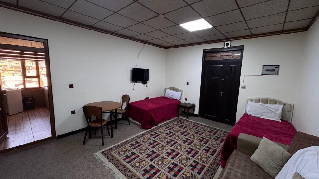 Postel nebo postele na pokoji v ubytování Nasim hotel