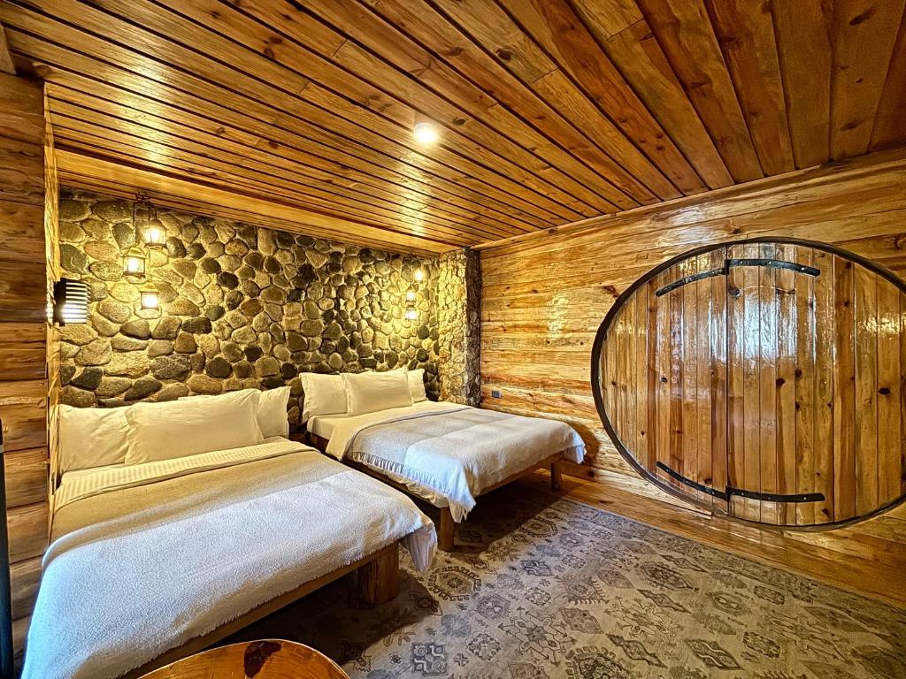 Uma cama ou camas num quarto em The Shire of Sagada