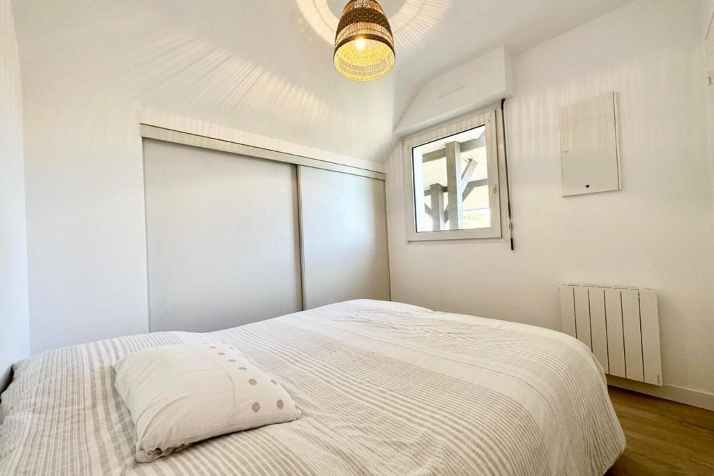Posteľ alebo postele v izbe v ubytovaní T2 Neuf Top Cocooning Terrasse - Face à la mer