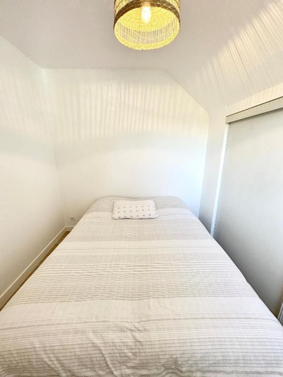 Posteľ alebo postele v izbe v ubytovaní T2 Neuf Top Cocooning Terrasse - Face à la mer