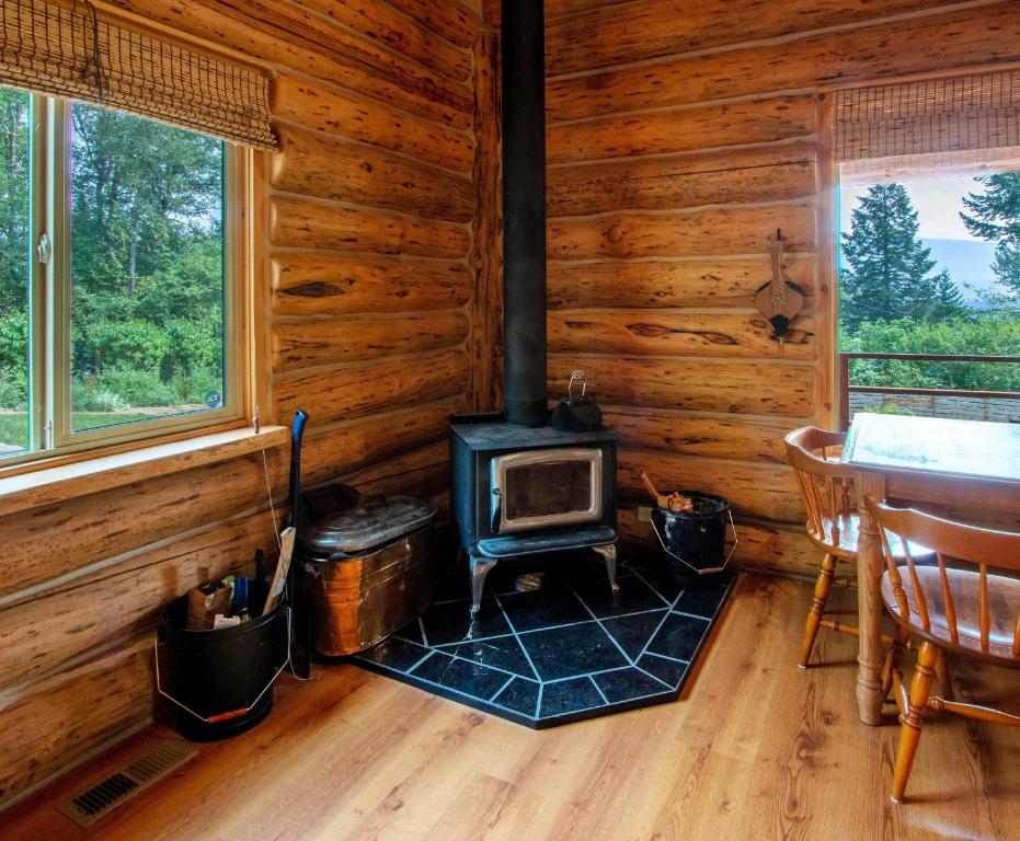 Posezení v ubytování The Log Cabin
