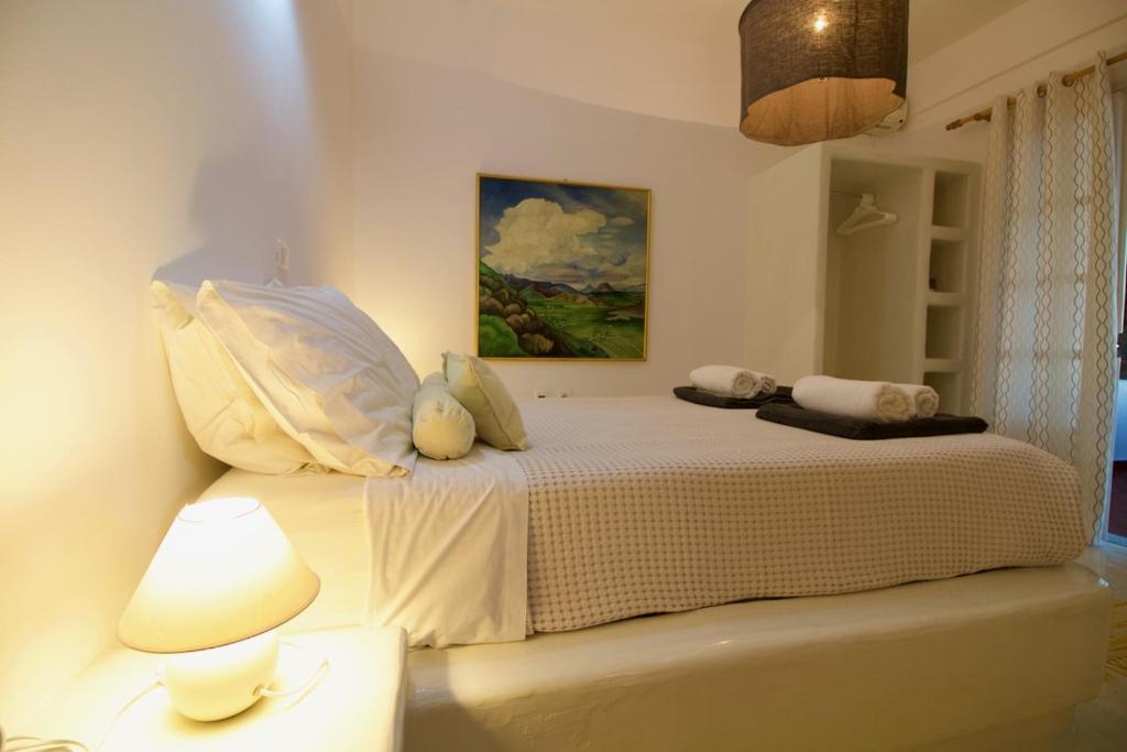 Postel nebo postele na pokoji v ubytování Blue Bay Heliolithos