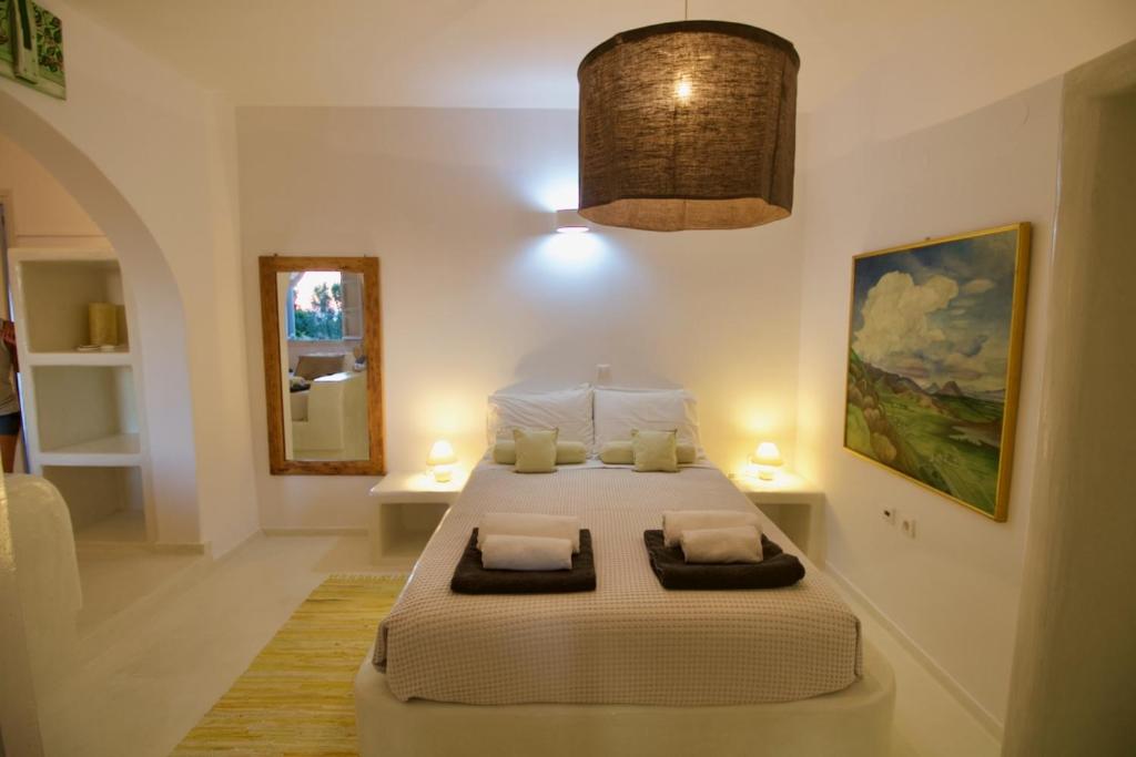 Postel nebo postele na pokoji v ubytování Blue Bay Heliolithos