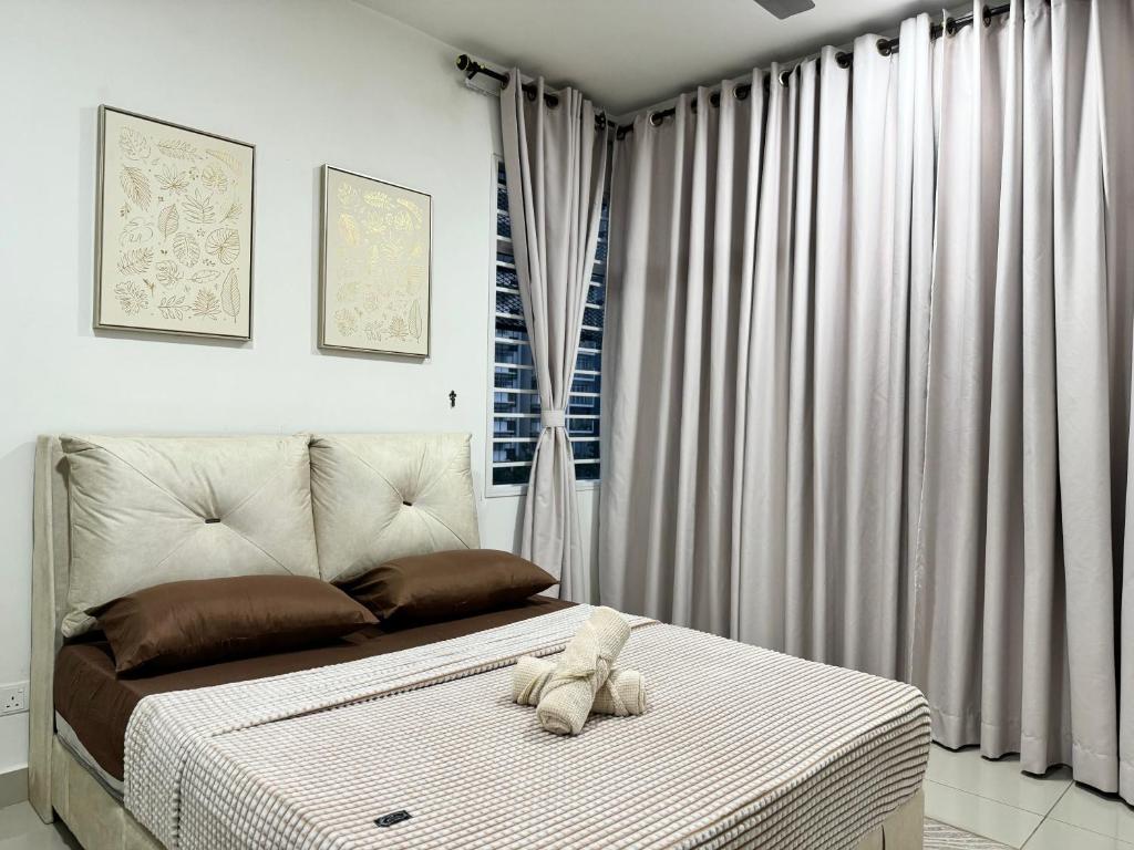 Posezení v ubytování Large Unit Dwiputra Residences 3Rooms 3Bathrooms Presint 15 Putrajaya