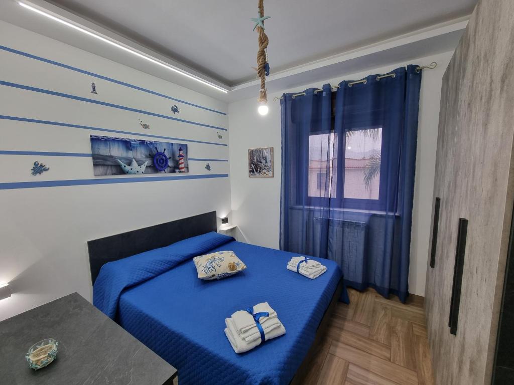 Postel nebo postele na pokoji v ubytování Vida Loca -Appartamento vicino aereporto e 200mt spiaggia