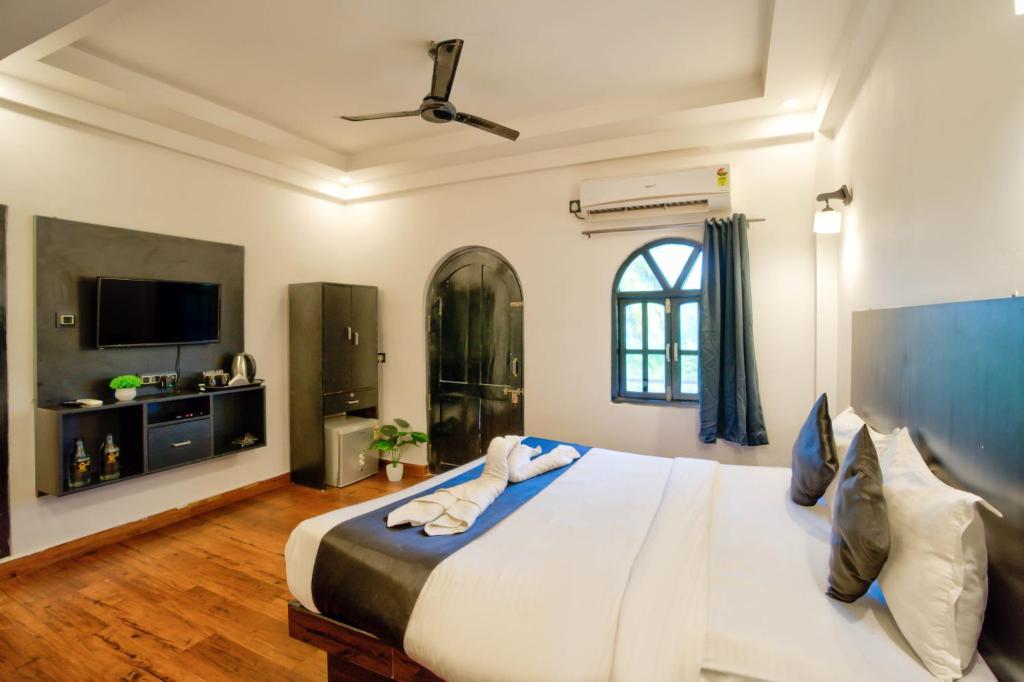 TV a/nebo společenská místnost v ubytování Hotel Vaggi's Place