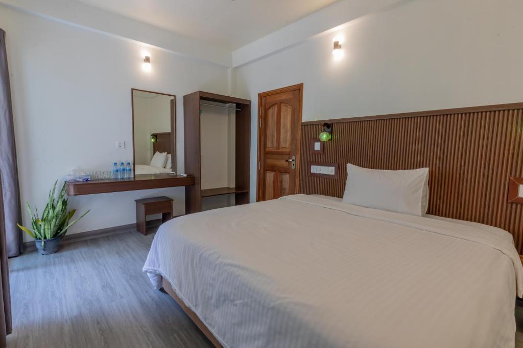 Postel nebo postele na pokoji v ubytování Dhoadhi Beach Maldives