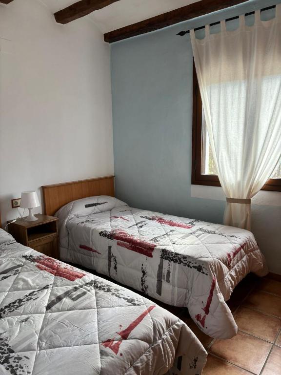 Postel nebo postele na pokoji v ubytování Casa Rue