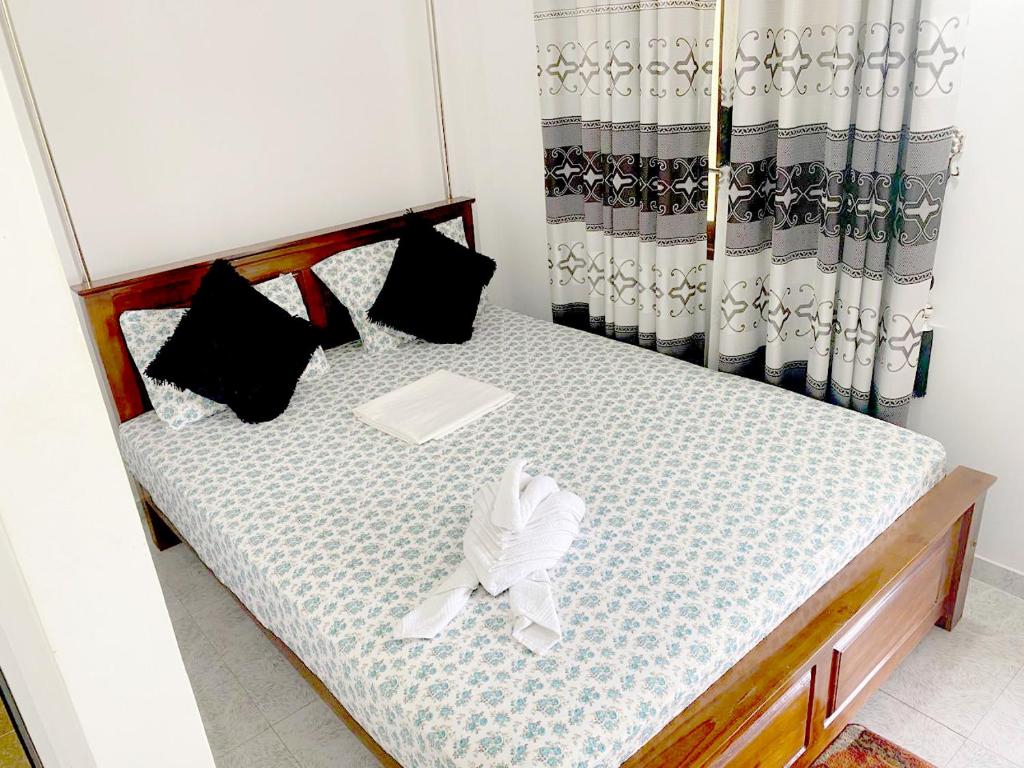 Postel nebo postele na pokoji v ubytování Haritha Resort Yala