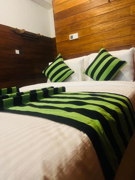 Postel nebo postele na pokoji v ubytování MUM Jungle Inn
