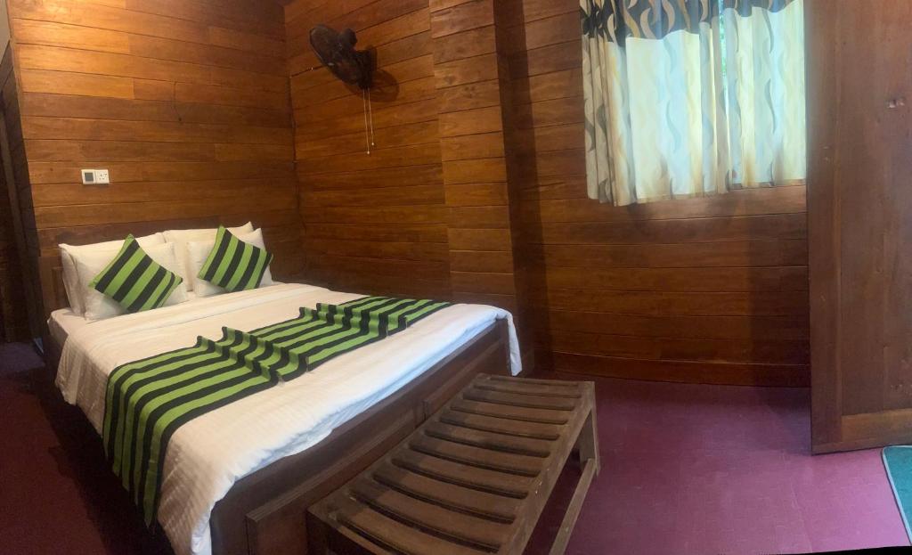 Postel nebo postele na pokoji v ubytování MUM Jungle Inn