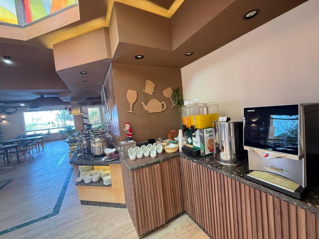 Kuchyň nebo kuchyňský kout v ubytování Modern 1BR Apartment - Al Dora Resort, Hurghada