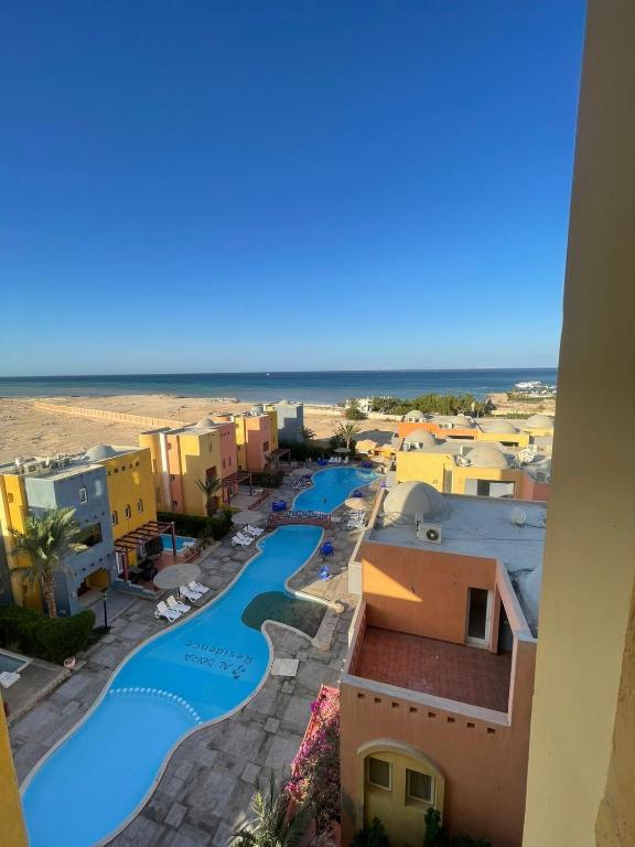 Bazén v ubytování Modern 1BR Apartment - Al Dora Resort, Hurghada nebo v jeho okolí