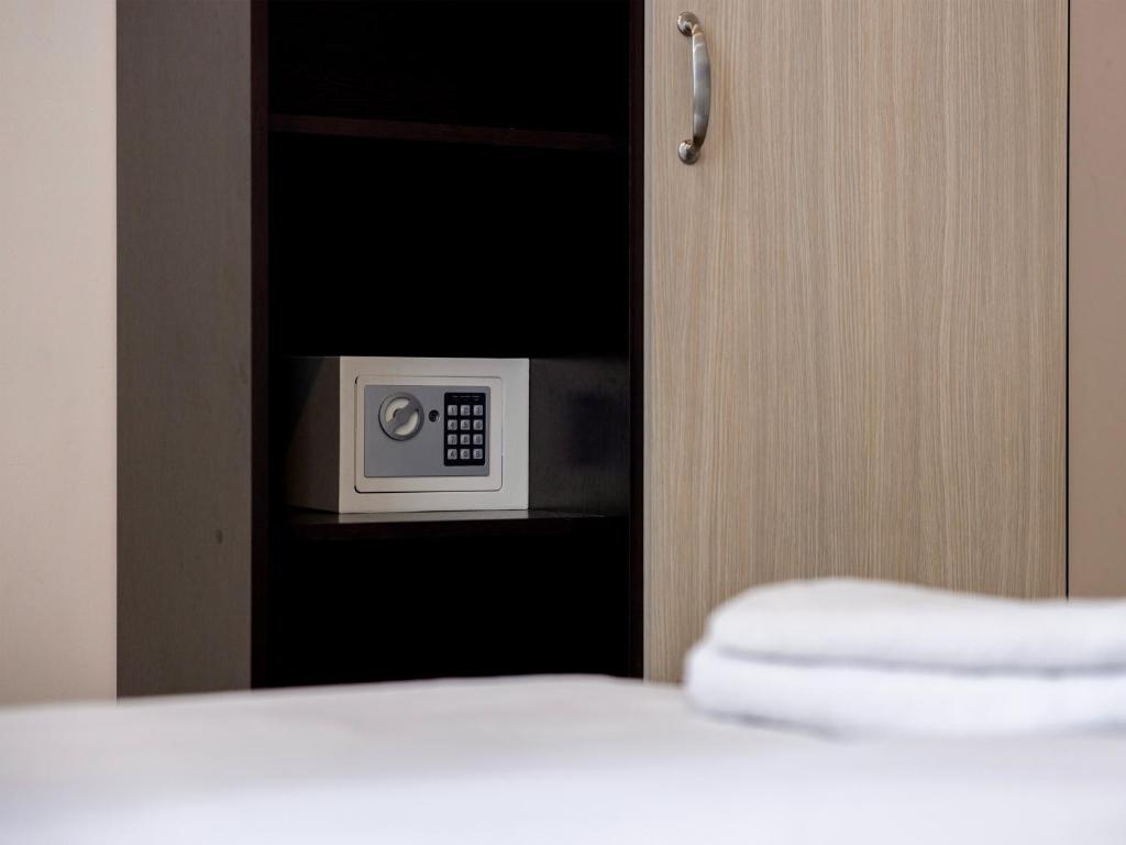Postel nebo postele na pokoji v ubytování Comfort Hotel