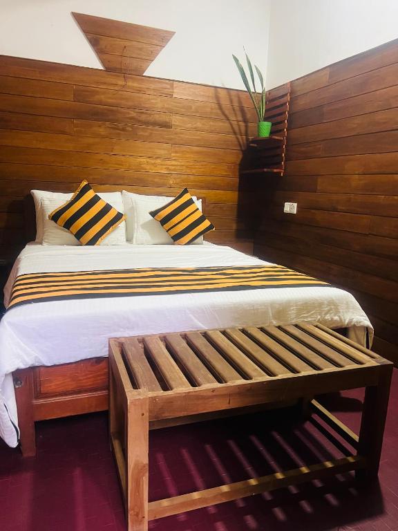 Postel nebo postele na pokoji v ubytování MUM Jungle Inn