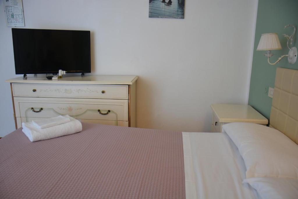 Posteľ alebo postele v izbe v ubytovaní Hotel Cordova