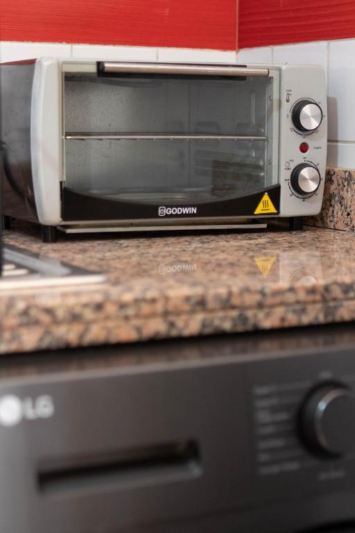Cuisine ou kitchenette dans l'établissement Cozy I Victor Hugo