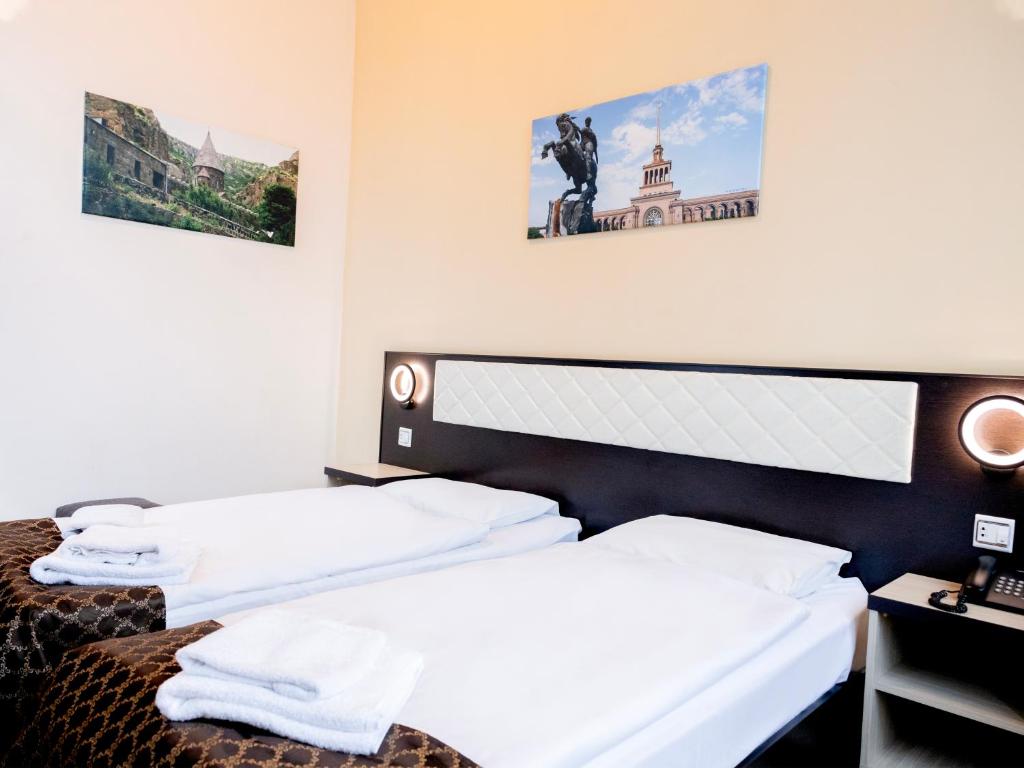 Postel nebo postele na pokoji v ubytování Comfort Hotel