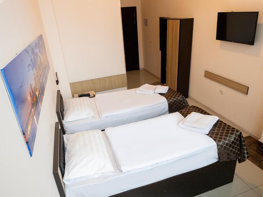 Postel nebo postele na pokoji v ubytování Comfort Hotel
