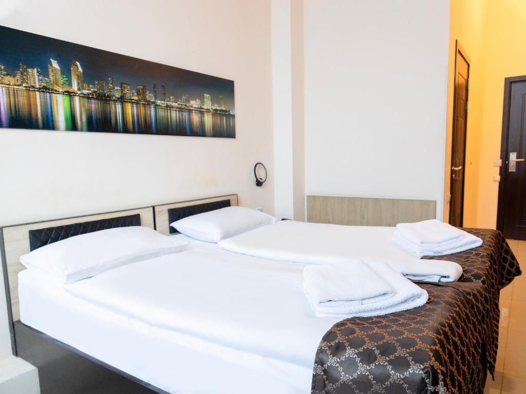 Postel nebo postele na pokoji v ubytování Comfort Hotel