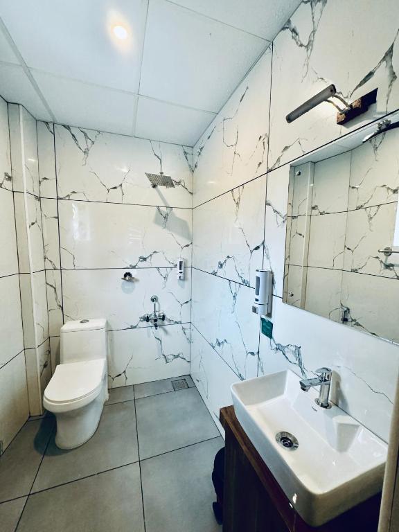 Koupelna v ubytování IvyArk Residency