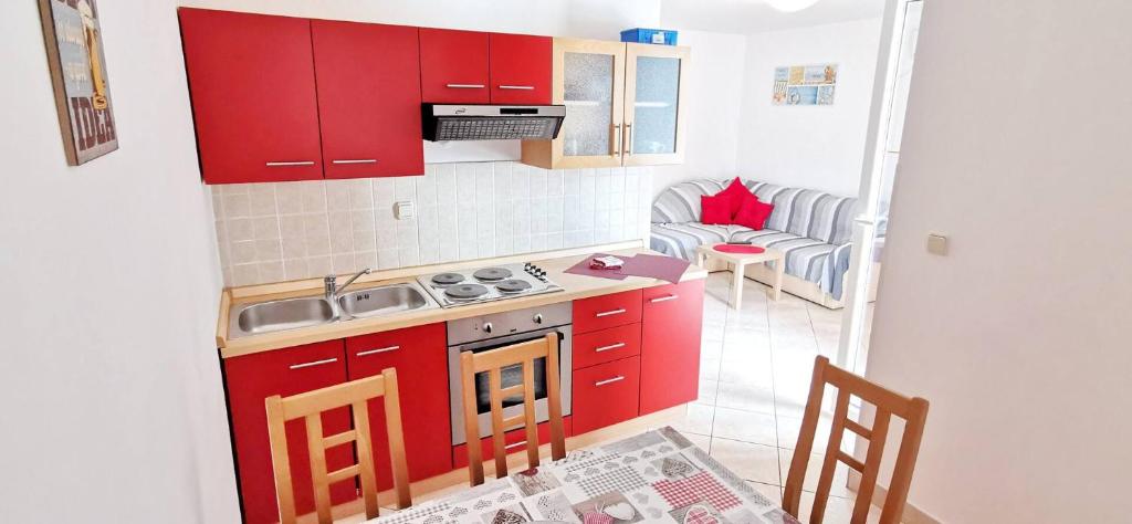 Kuchyňa alebo kuchynka v ubytovaní Apartments Posta