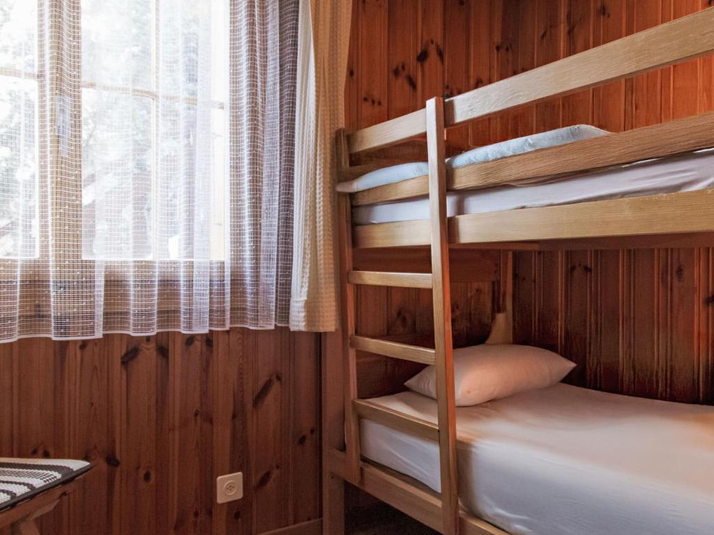 Postel nebo postele na pokoji v ubytování Chalet Magicien by Interhome