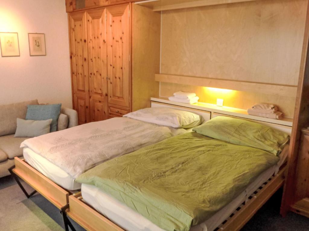 Postel nebo postele na pokoji v ubytování Apartment Oasis by Interhome