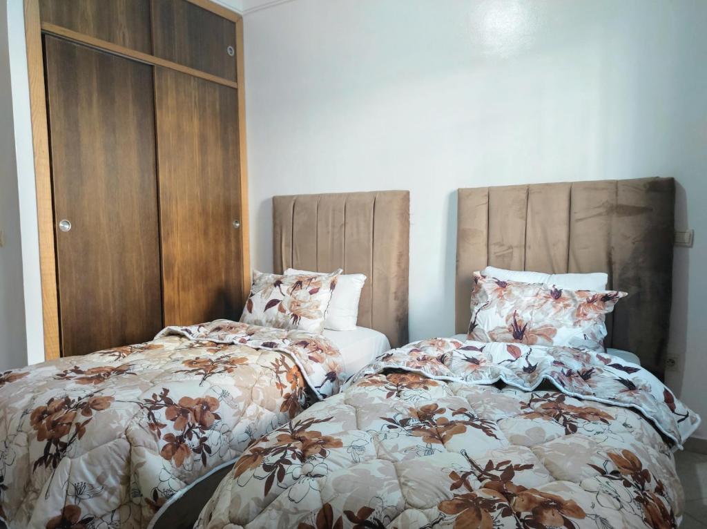 Кровать или кровати в номере Oasis Airport Rabat-Salé