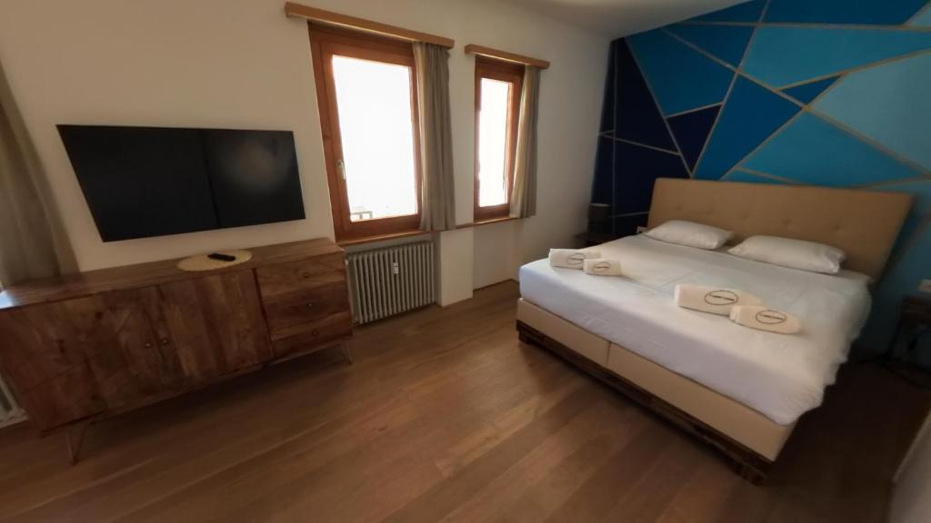 Postel nebo postele na pokoji v ubytování 7Rooms