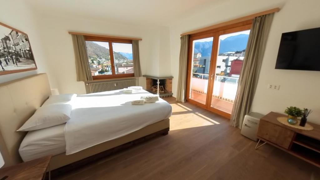 Postel nebo postele na pokoji v ubytování 7Rooms
