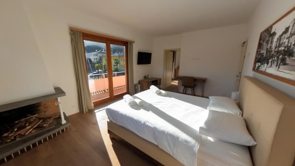Postel nebo postele na pokoji v ubytování 7Rooms