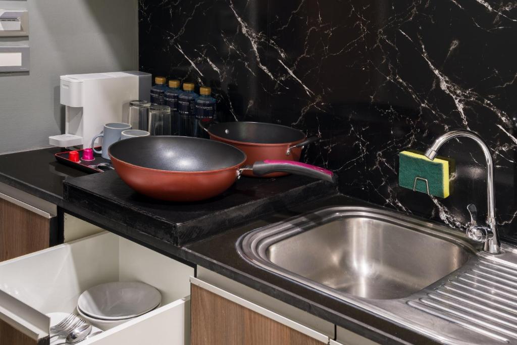 Aspira Suites Sukhumvit 20 - Resim 17