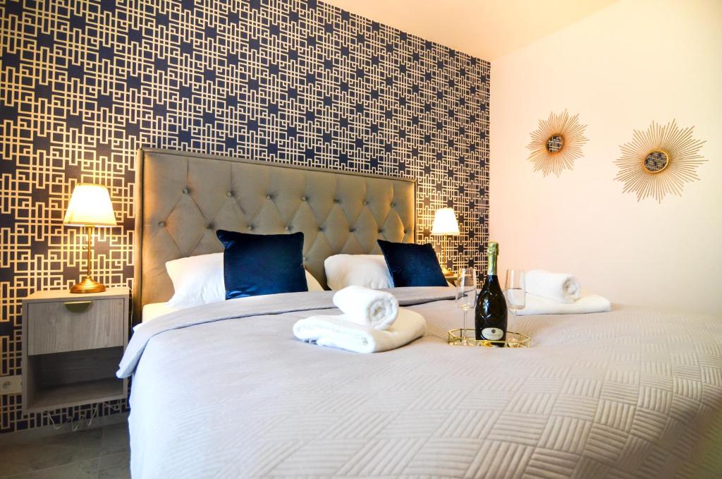 Postel nebo postele na pokoji v ubytování Residence Barrique Valtice - private wellness