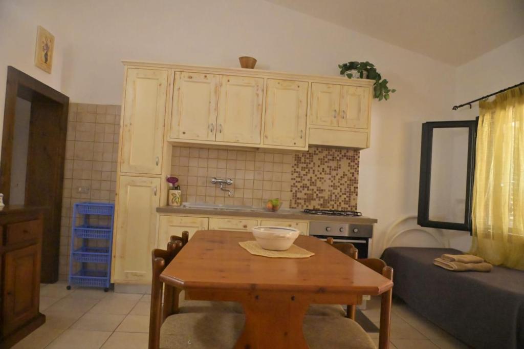 Kuchyň nebo kuchyňský kout v ubytování Appartamenti Frassanito