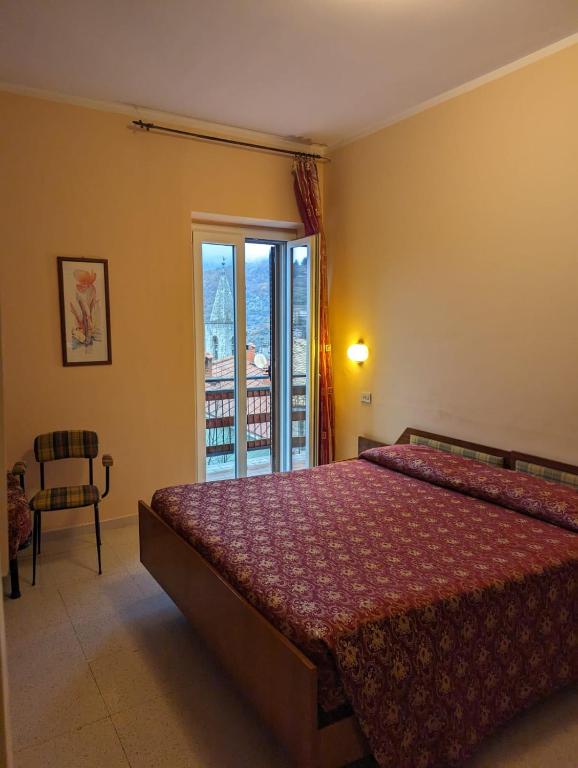 Postel nebo postele na pokoji v ubytování Albergo Seggiovia