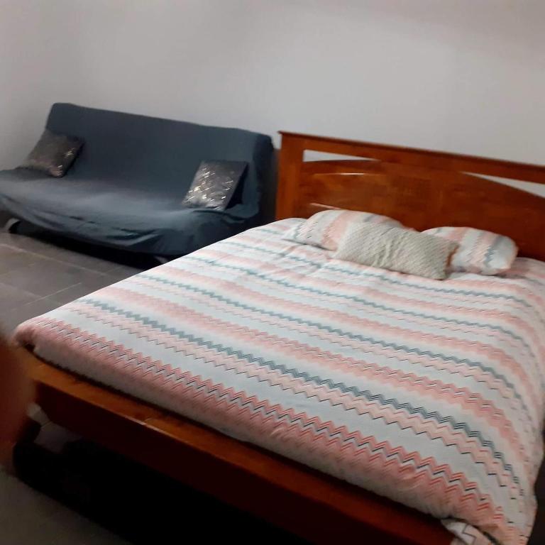 Postel nebo postele na pokoji v ubytování LeuTIBONHEUR