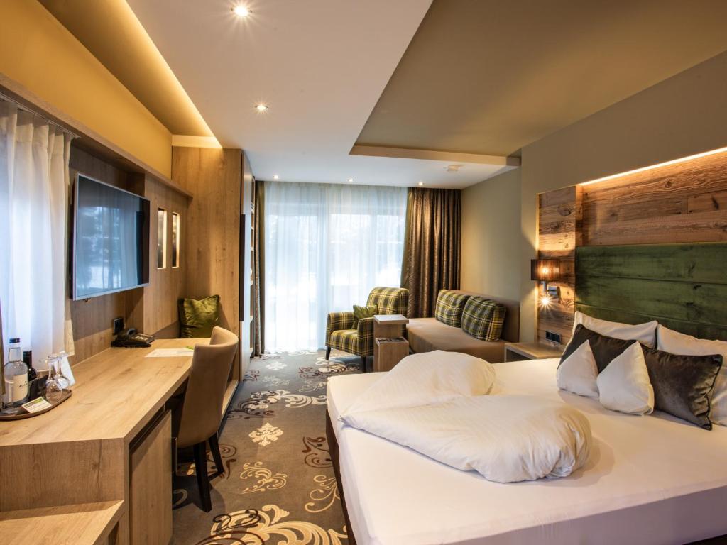Postel nebo postele na pokoji v ubytování Hotel Bergruh