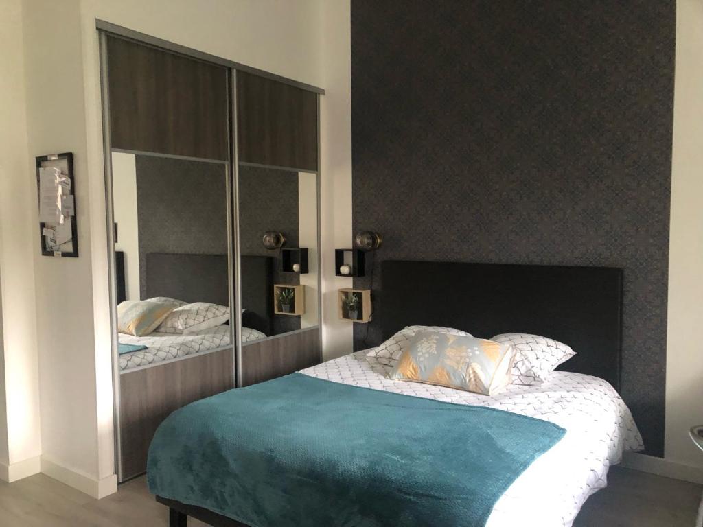Postel nebo postele na pokoji v ubytování Chambre d'Hôtes Les Bacquerins