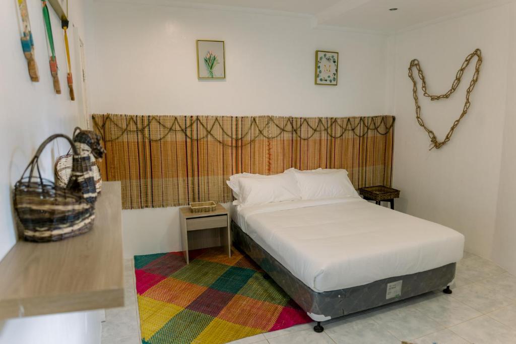 Postel nebo postele na pokoji v ubytování 8 Plus Beach Resort